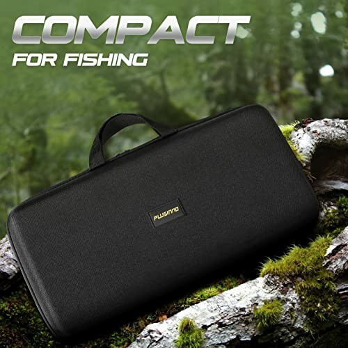 Compact black fishing case on mossy log with forest background.