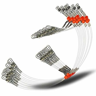 Coiled fishing leader lines with metal swivels and red beads.
