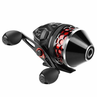 Modern black and red fishing reel with ergonomic handle.