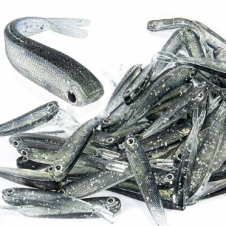A pile of realistic fish-shaped fishing lures.